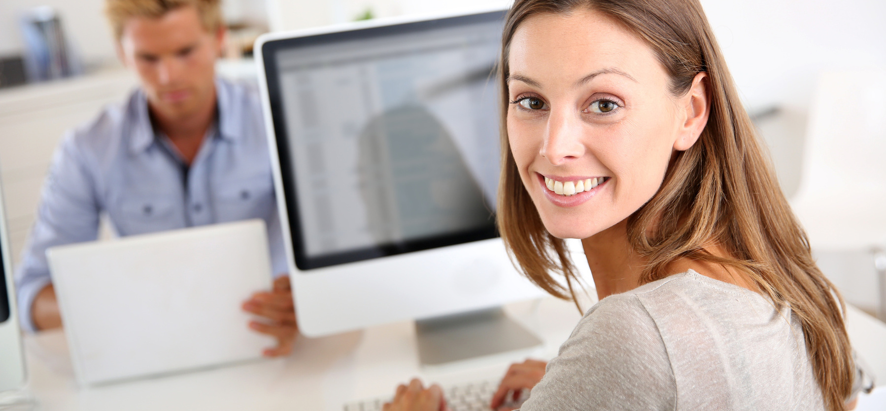 business, businesswoman, businessman, man, girl, young, assistant, woman, employees, desktop, computer, office, job, saleswoman, sales people, secretary, manager, startup, working, workplace, 30, 30 years old, young adults, background, casual, confident, desk, friendly, attractive, sitting, smiling, smile, portrait, people, design, computing, colleagues, team, workmates, office-worker